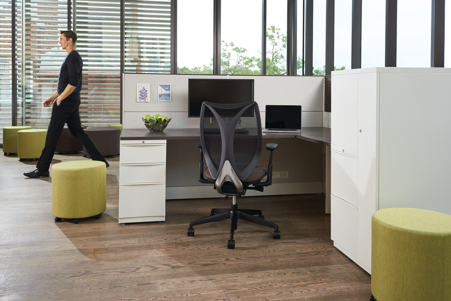 Office space with white and grey cubicle. 